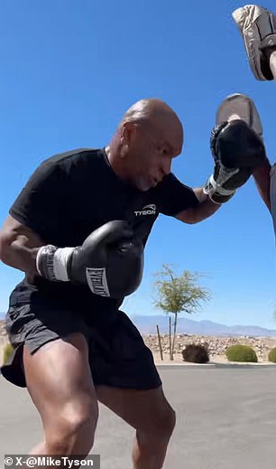 Mike Tyson is seen training before the fight with Jake Paul