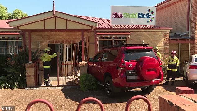 Children at a daycare center in Sydney's west were not injured when an out-of-control car crashed into the building's entrance on Friday morning.