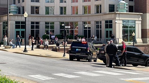 Missouri police are in a standoff with a shooter who took hostages in the St Charles parking lot near City Hall.