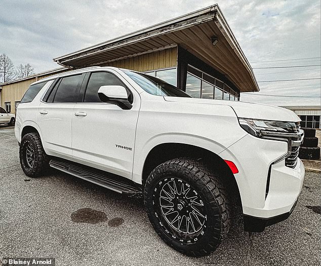 Pictured is Arnold's $84,000 Chevrolet Tahoe, which was financed by GM Financial.