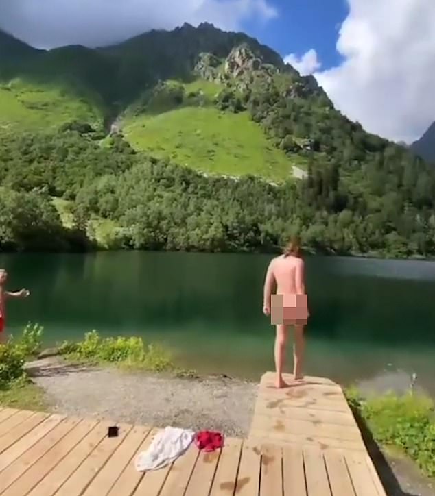 Alison Hammond's boyfriend David Putman, 26, has been filmed swimming naked in a Russian lake.