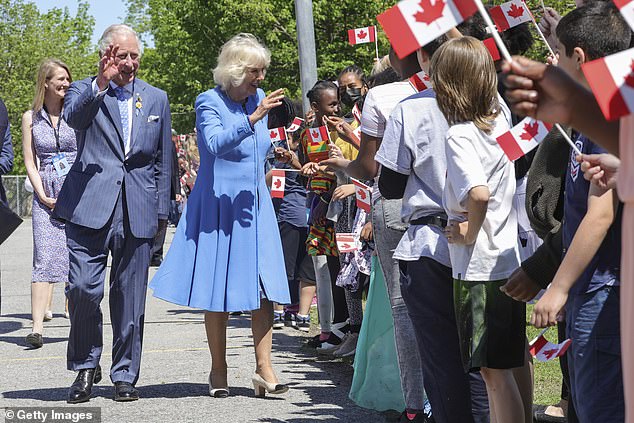 Prince Charles, the Prince of Wales and Camilla, Duchess of Cornwall meet and greet local schoolchildren from Assumption School on the second day of their Platinum Jubilee royal tour of Canada on May 18, 2022 in Ottawa, Canada.