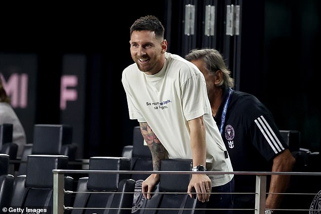 Messi looks from the sidelines during the second half of the match against Monterrey