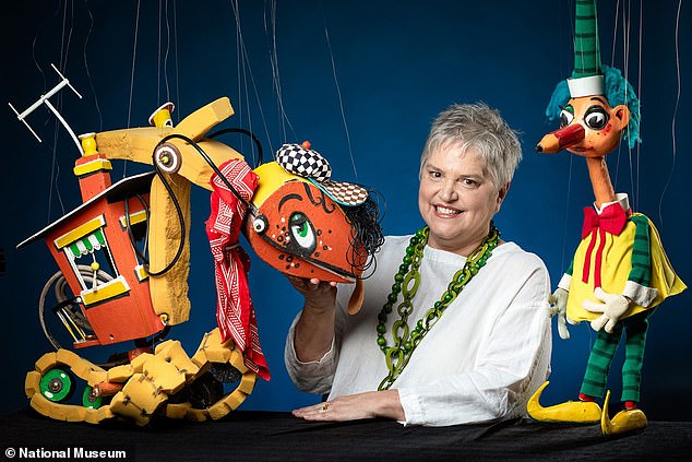 Rebecca, 62, features in a new exhibition which features a series of old photographs from the show created by her father Norman Hetherington.  Pictured: Rebecca with Mr. Squiggle (right) and Steamshovel Bill (left)