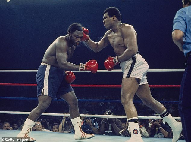 Heavyweight boxers Muhammad Ali (white shorts) and Joe Frazier are seen during their championship fight in Quezon City, Manila, Philippines on October 1, 1975.