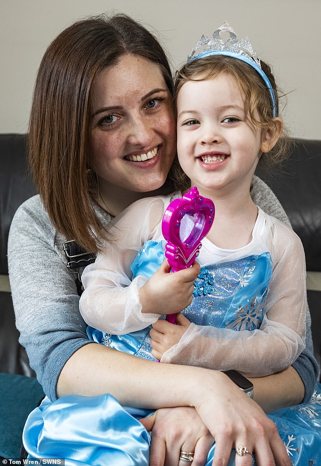 Emma Evans says her three-year-old daughter Amelia (pictured together) saved her life after suffering a seizure.