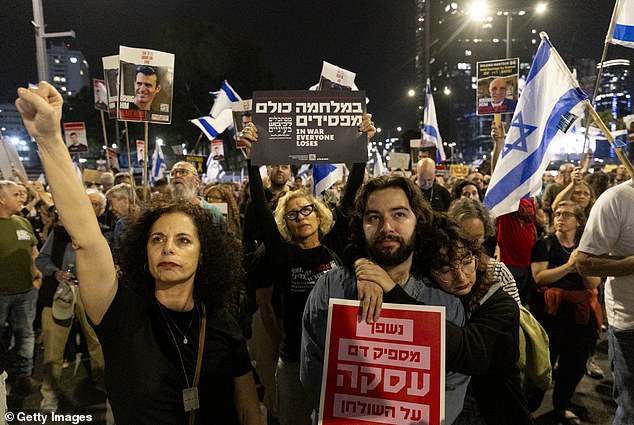 Protesters in Tel Aviv demonstrate in favor of a hostage deal with Hamas and against the Israeli prime minister on April 20, 2024.