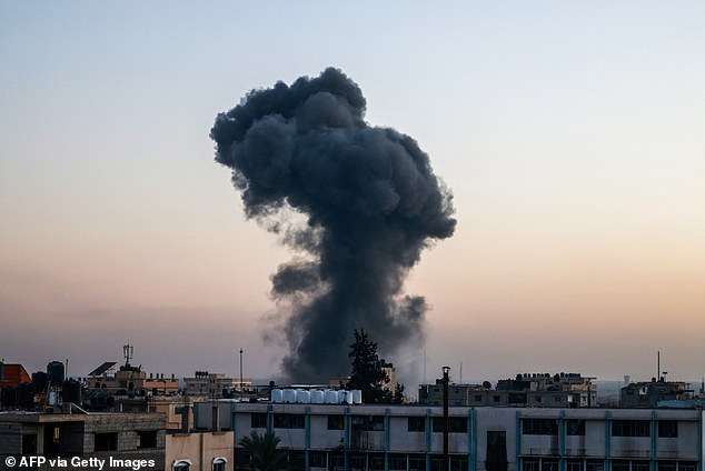 Smoke rises over buildings after an Israeli attack in Rafah, southern Gaza Strip, April 4, 2024, amid the ongoing conflict between Israel and the Palestinian militant group Hamas.