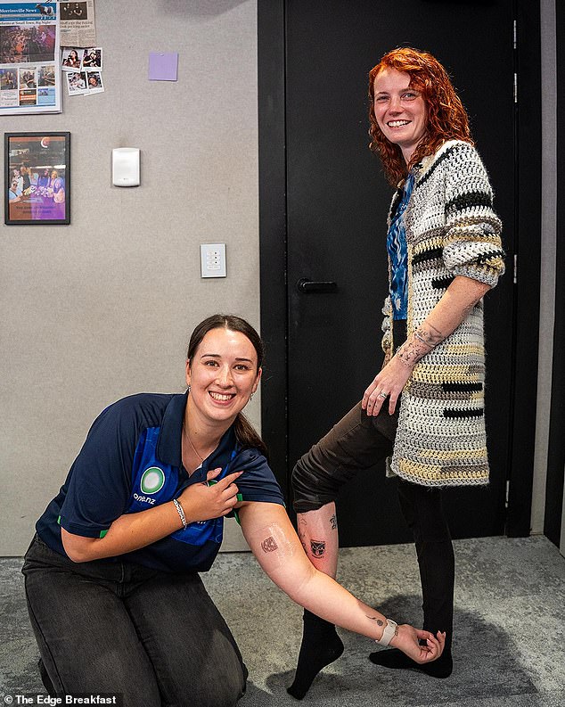 Two New Zealand football fans (including Hayley Young, left) have boldly chosen to get 'Champions 2024 Warriors' tattoos to permanently show their support for Andrew Webster's NRL team.