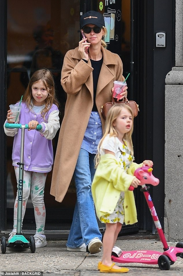 Nicky Hilton was seen cutting a stylish figure while frolicking around New York City with her daughters after a run at Starbucks on Friday.