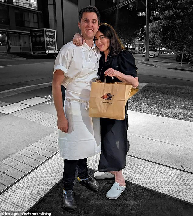 Nigella Lawson (right) was photographed with chef Josh Niland (left) after dining at his Sydney restaurant last week.  They both wore an 'industry secret' shoe.