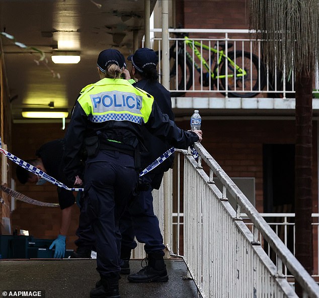 Police cordoned off the entrance to the large housing commission block in Sydney's eastern suburbs.