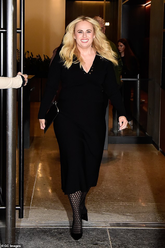 Rebel Wilson didn't seem to have a care in the world as she left a taping of Watch What Happens Live with Andy Cohen on Wednesday, just hours after news broke that her book was being pulled both online and in bookstores in Australia.