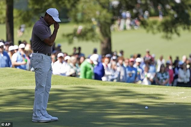 Tiger Woods' longest day at Augusta National was a fight between light and darkness