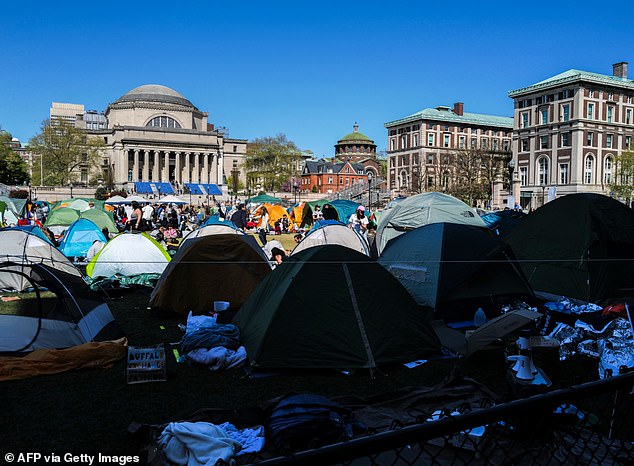 Parents of Columbia students are encouraged to demand refunds after the university canceled all in-person classes as it struggles to control pro-Palestinian protests.  Groups of protesters are seen on the ground on April 23.