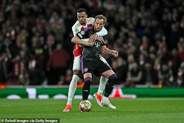 Arsenal defender Gabriel tangles with Bayern Munch striker Harry Kane on Tuesday night
