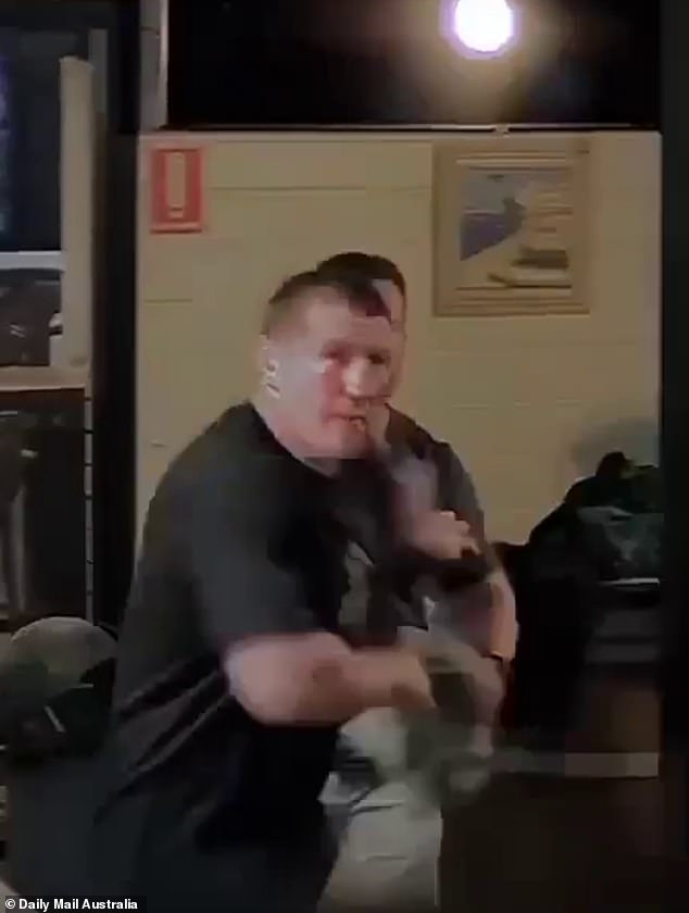 Police have completed an investigation into a pub brawl involving Paul Gallen after Daily Mail Australia published footage of the wild brawl.  In one video, a staff member wiped Gallen's face with a cloth before he turned around when a customer made a cheeky comment (above).