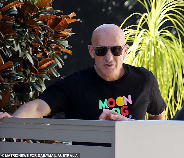 Former NRL player turned convicted criminal John Elias is pictured outside Paul Kent's home on Sunday morning.
