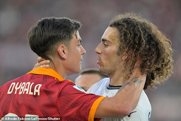 Roma star Paulo Dybala clashes with Lazio midfielder Matteo Guendouzi during the Rome derby