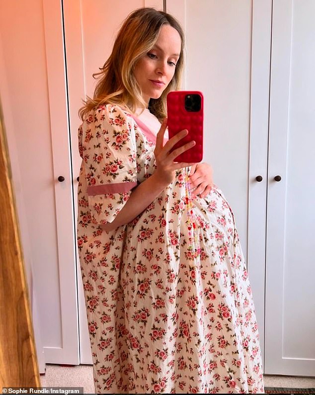 Peaky Blinders star Sophie Rundle cradled her burgeoning baby bump as she took to Instagram to share a baby bump update on Friday, after revealing she is expecting her second child.