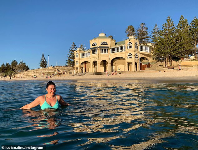 In Perth, the median house price rose 20 per cent over the past year to $735,276 to remain Australia's most affordable mainland state capital market, new data from CoreLogic showed (pictured, a swimmer at Cottesloe Beach).