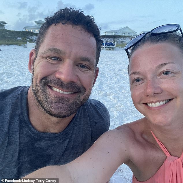 Lindsay Terry Candy, 39, photographed with her husband Jonathon, 42, during a vacation in Florida in 2023.