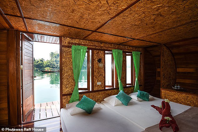 Shown above is one of Phutawan Raft House's capsule cabins.  Each room has its own small terrace, but no bathroom.