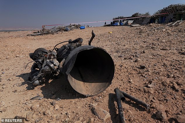The remains of a rocket booster that Israel says seriously injured a seven-year-old girl