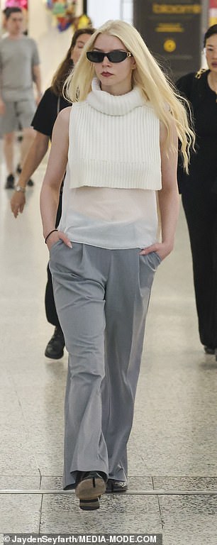 Anya Taylor-Joy, 28 (pictured), turned Sydney International Airport into her personal runway on Tuesday when she stepped off a flight looking incredibly stylish.
