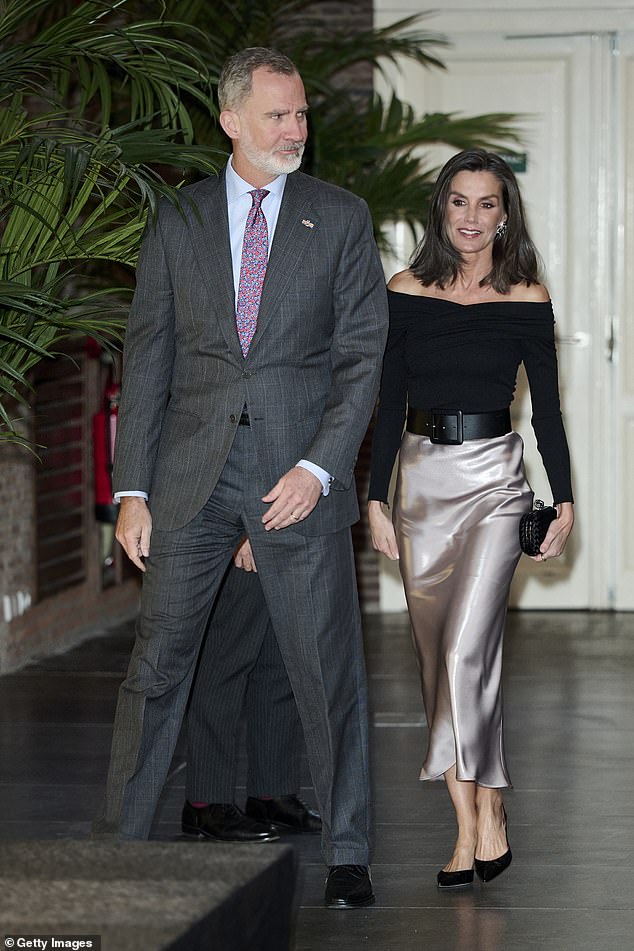 Queen Letizia of Spain made sure to dazzle at her reception in Amsterdam on the first day of the royal state trip to the Netherlands.  Pictured with King Philip