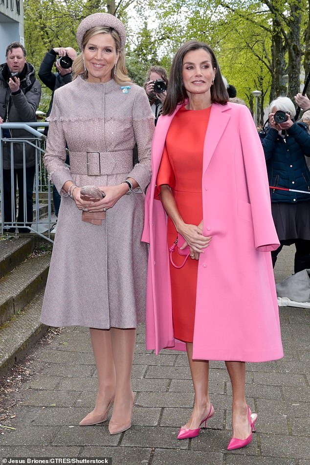 Queen Máxima (L) and Queen Letizia (R) looked stunning in coordinated pink outfits in Amsterdam today.