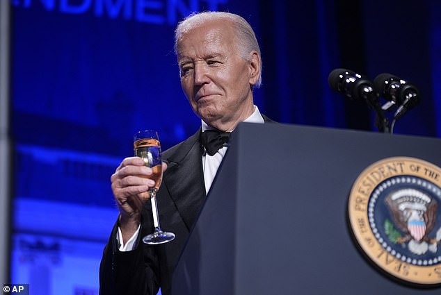 President Joe Biden toasts a free press during Saturday press conference