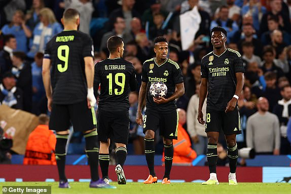 MANCHESTER, ENGLAND - MAY 17: Eder Militao of Real Madrid and his teammates appear dejected during the second leg of the UEFA Champions League semi-final between Manchester City FC and Real Madrid at the Etihad Stadium on May 17, 2023 in Manchester, United Kingdom. (Photo by Chris Brunskill/Fantasista/Getty Images)