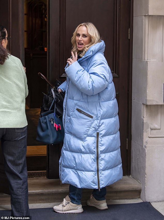 Rebel Wilson appeared to ignore her book controversy when she visited the Gillian Lynne Theater in London to see Standing at the Sky's Edge on Tuesday night.