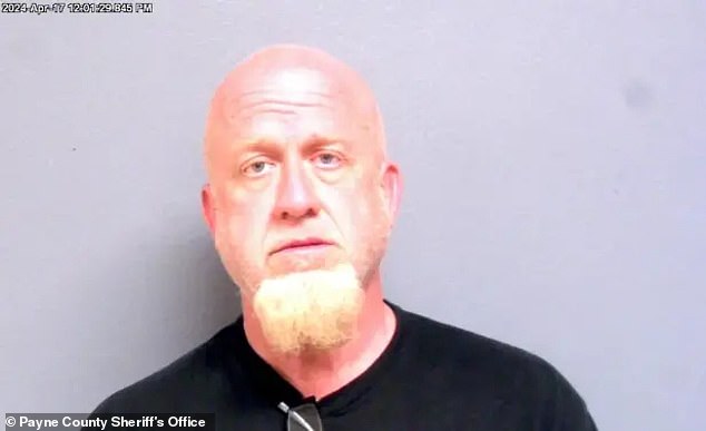 Sean Patrick Palmer, 49, was arrested and charged with throwing a pipe bomb onto the porch of a satanic temple last week.