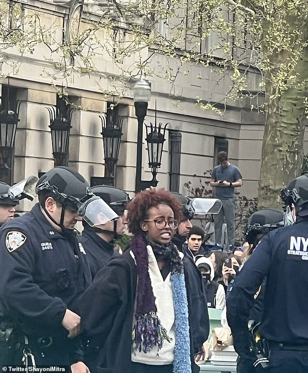Isra Hirsi, the daughter of Rep. Ilhan Omar, appears handcuffed and arrested on the Columbia campus Thursday.  She has been participating in an anti-Israel demonstration at the university.