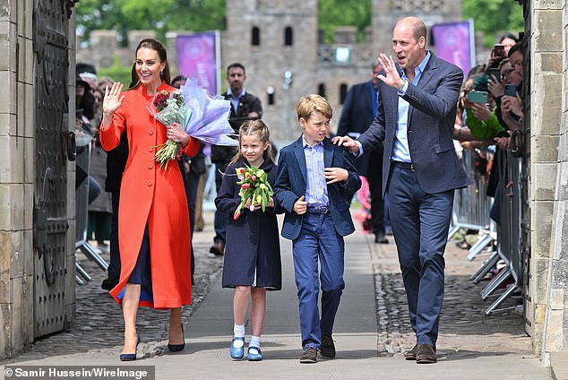Prince William and Kate Middleton with their children, Prince George and Princess Charlotte, at Cardiff Castle on Princess Lilibet's first birthday.