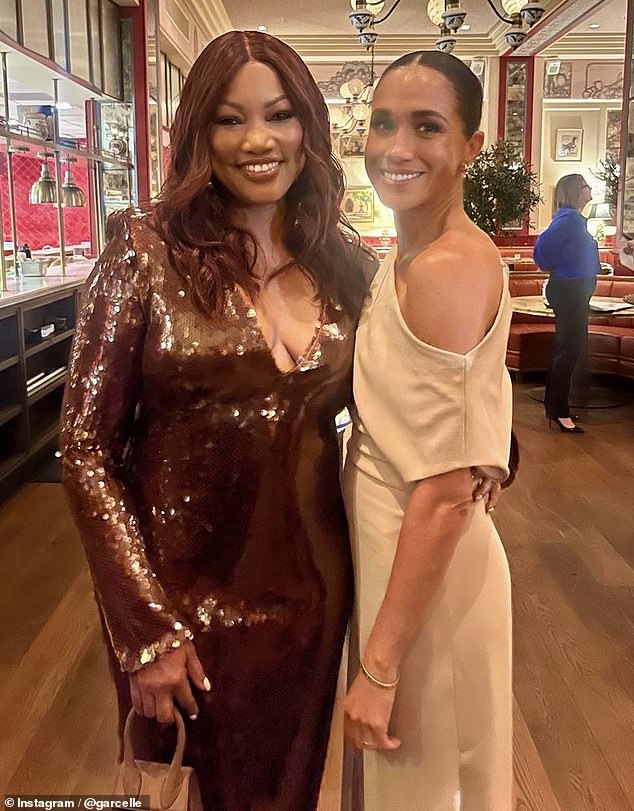 Garcelle Beauvais, known for her time on The Real Housewives of Beverly Hills, has become the latest A-lister to join the exclusive 'jamfluencer' club.  Above: Meghan and Garcelle in November 2023