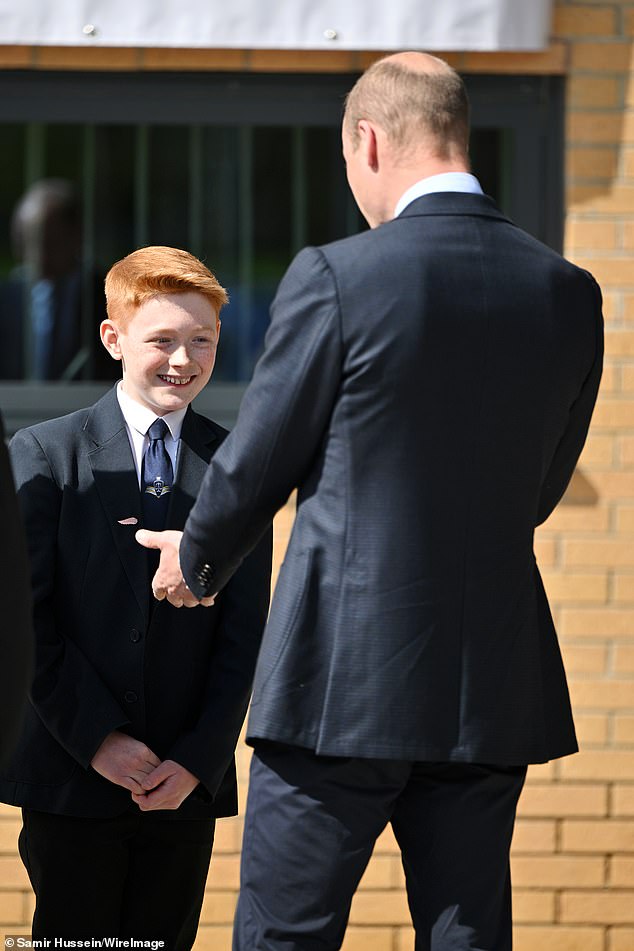 Prince William greeted Freddie Hadley (left) today and praised him for his letter 