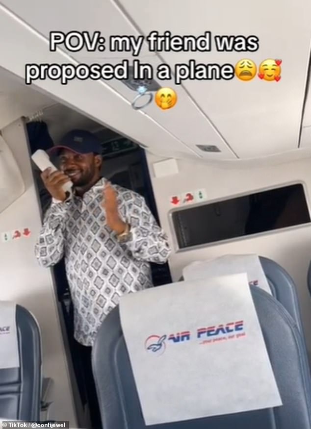 This is the romantic moment a man proposed to his girlfriend on board a plane using an onboard public address system (pictured: the unknown man on TikTok)