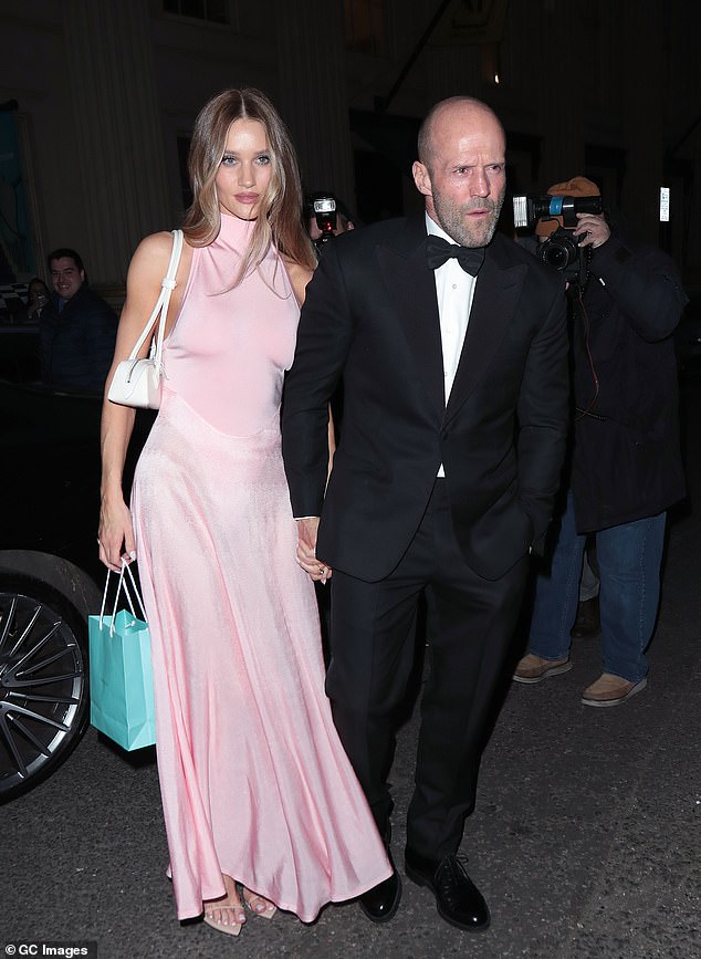 Rosie Huntington-Whiteley and her fiancé Jason Statham looked incredible while attending Victoria Beckham's 50th birthday party at Oswald's in London.
