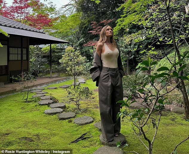 Rosie went braless in a tight top and baggy pants in Instagram photos shared on Thursday (her 37th birthday) while in Tokyo.