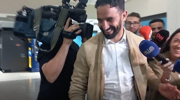 Rubén Amorim was greeted by a swarm of journalists after landing back in Portugal on Tuesday.