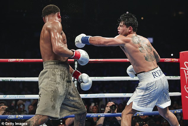 Ryan Garcia (right) punches Devin Haney during his impressive victory in Brooklyn.