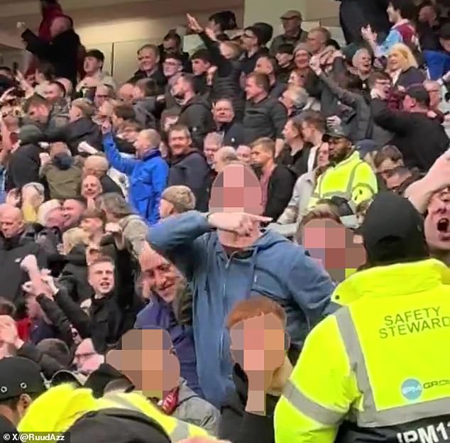 A Burnley supporter has been accused by police of singing tragic chants after being seen making what were alleged to be airplane gestures towards Man United fans on Saturday.