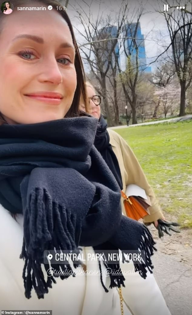 Former Prime Minister of Finland Sanna Marin has shared selfies from her recent trip to New York (pictured: Sanna walks through Central Park with a friend)