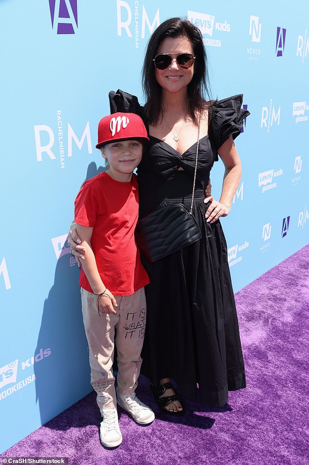 Tiffani Thiessen showed off her modern style while out and about with her son Holt, 8, at the PS ARTS Express Yourself event in Los Angeles on Sunday.
