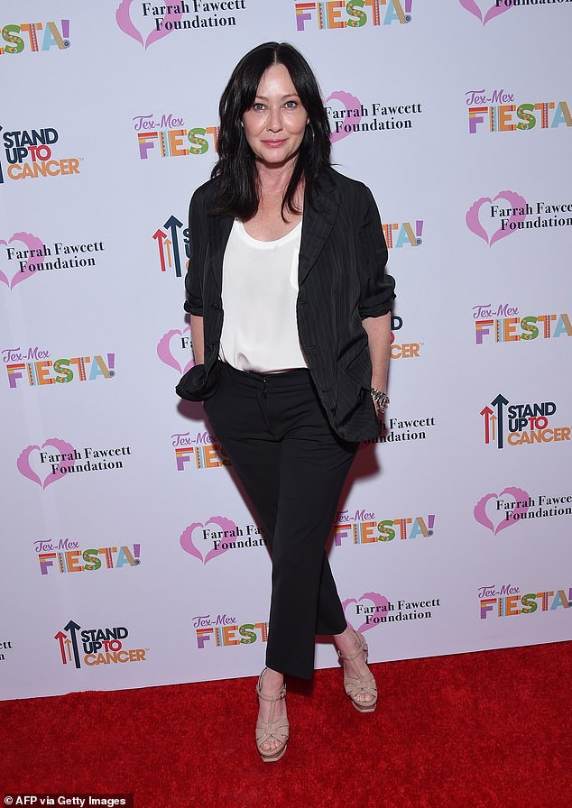 Shannen Doherty has spoken about her desire to pay tribute to her late father with a tattoo, but refused to do so due to the risk of infection.