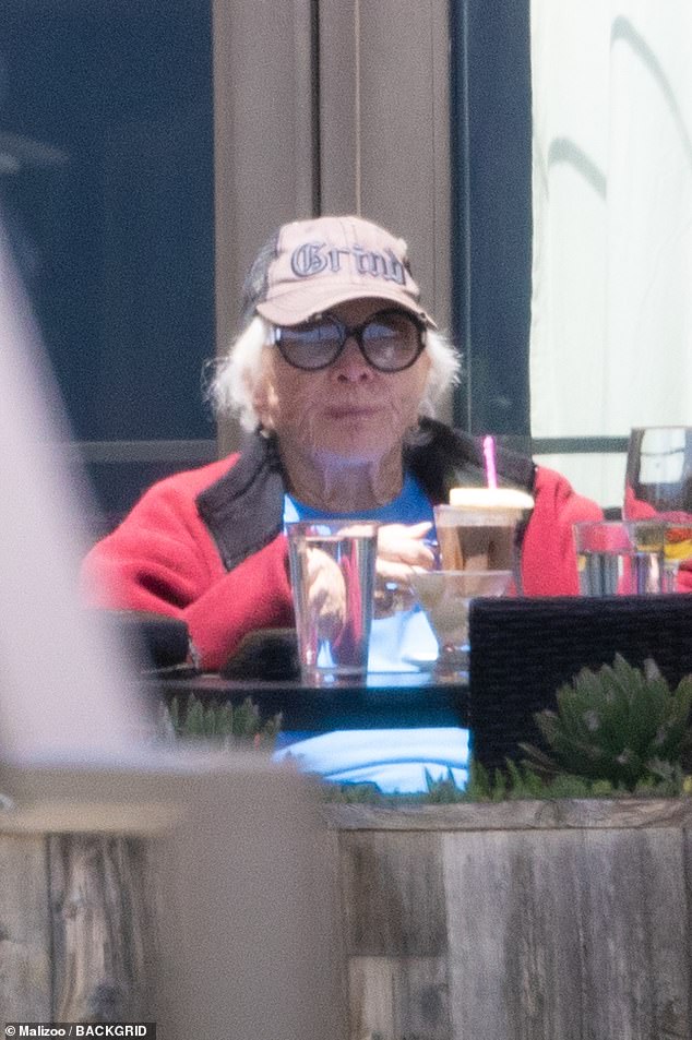 The Oscar winner sported a trucker cap over her white hair and wore black sunglasses for her low-key celebrations.