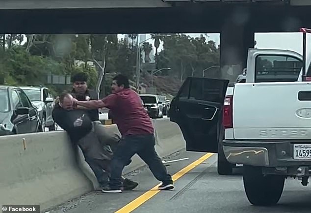 A father and his son were captured on video throwing punches at a middle-aged driver in a fight on a busy California highway Tuesday afternoon.